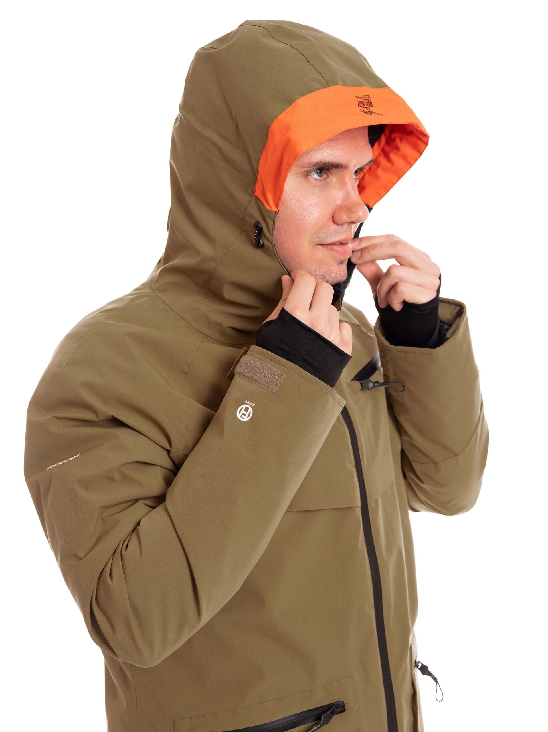 man wearing gold brown light padded ski jacket side 1