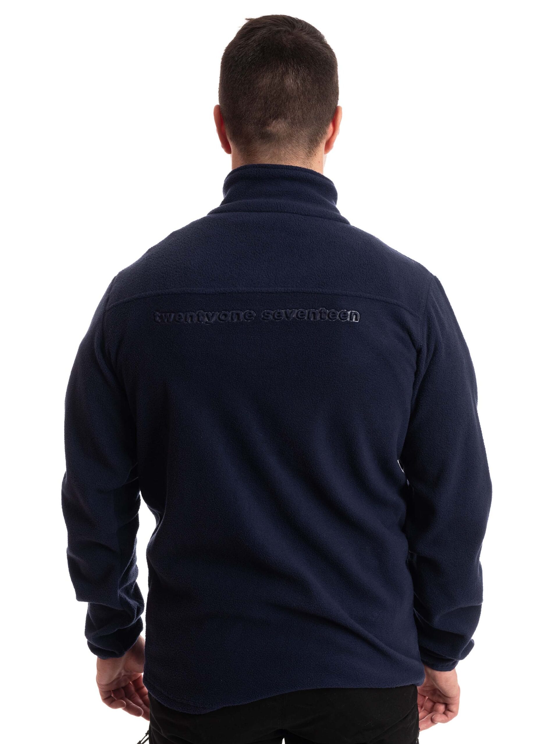 man wearing navy micro fleece jacket back 1