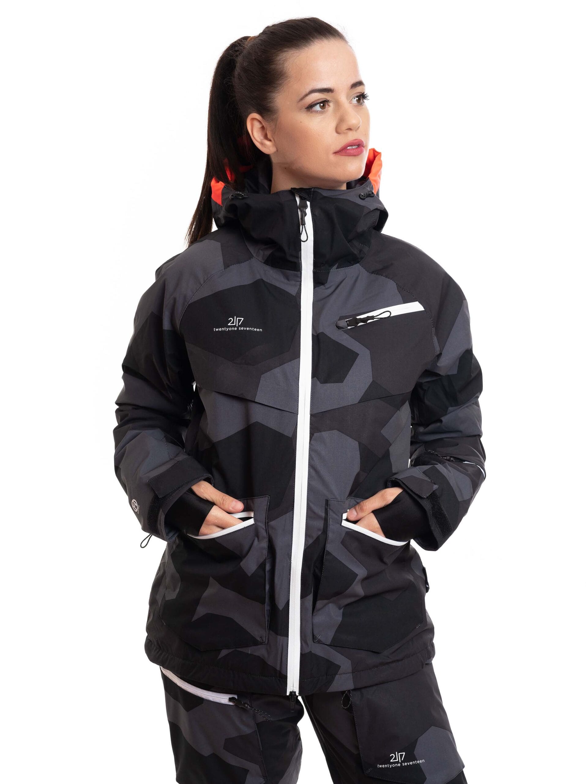 woman wearing black camo light padded ski jacket