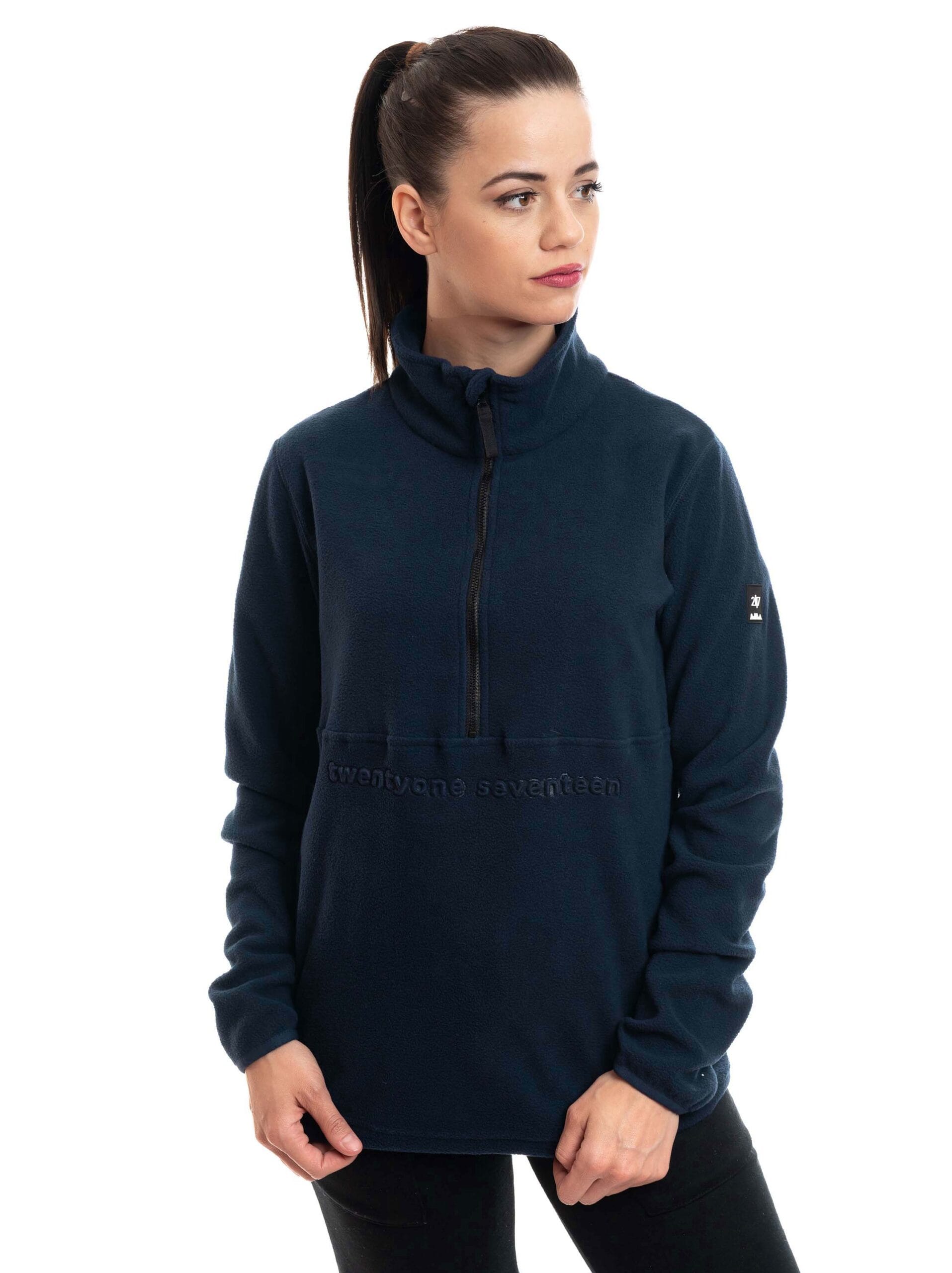 woman wearing navy fleece sweater 1